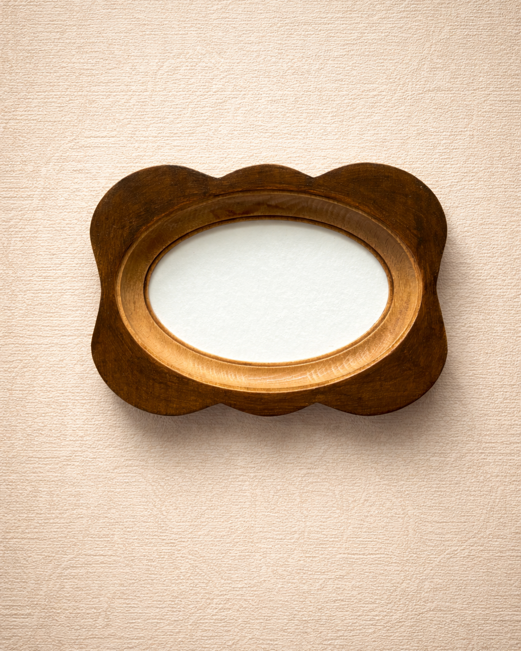 Wooden frame on a beige textured background