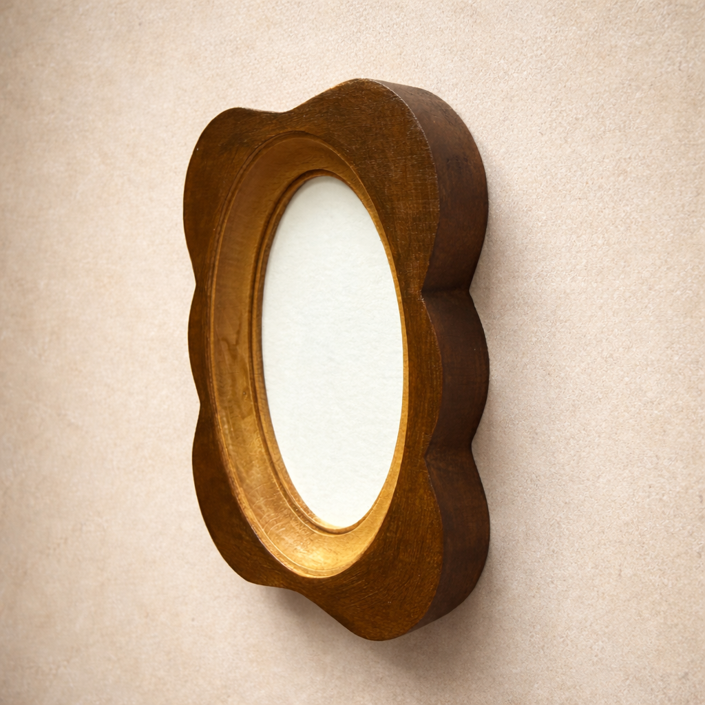 Wooden photo frame on a beige wall