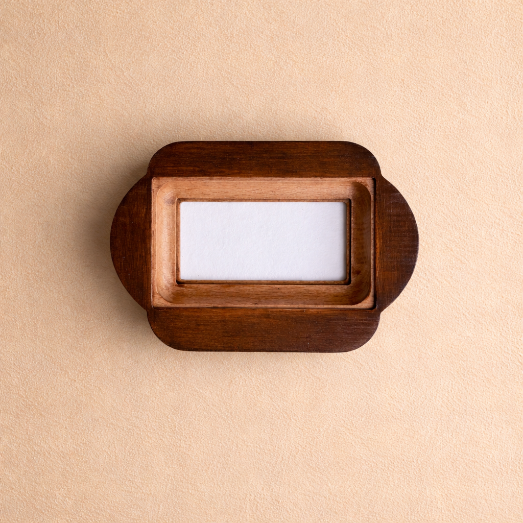 Wooden picture frame on a beige background