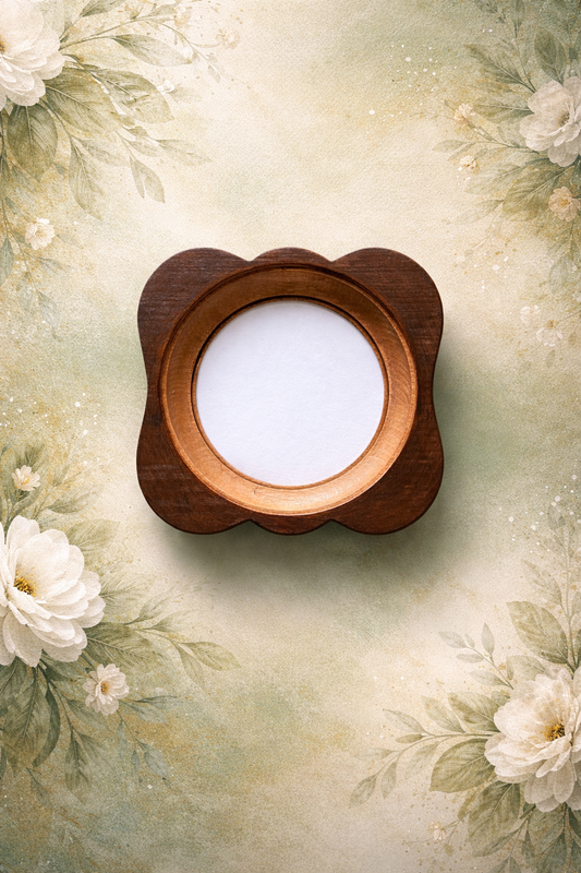 Wooden circular frame on a floral background